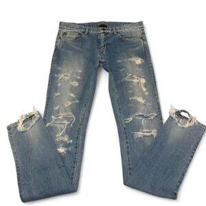 Denim colored ripped jeans washed with water